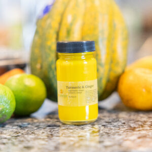 Jar of turmeric and ginger supplement