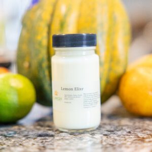 Lemon elixir jar with limes and lemons
